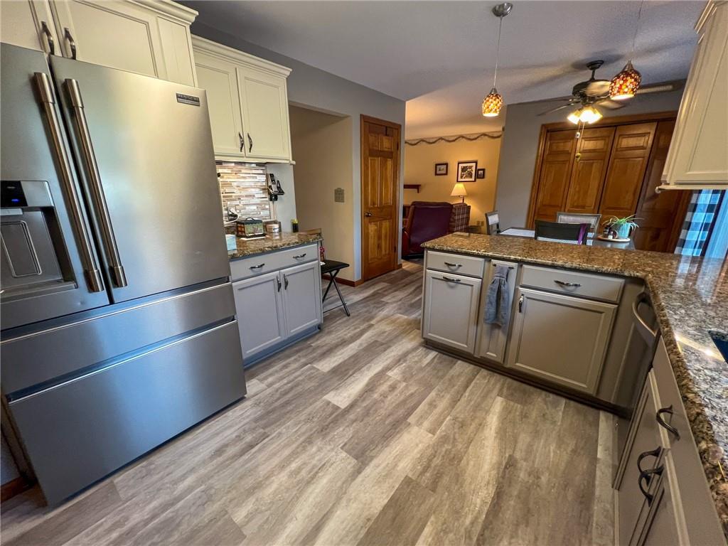 100 Marion Drive Butler, PA 16001 - Photo 9 of 45 a kitchen with stainless steel appliances granite countertop a refrigerator a stove and a sink
