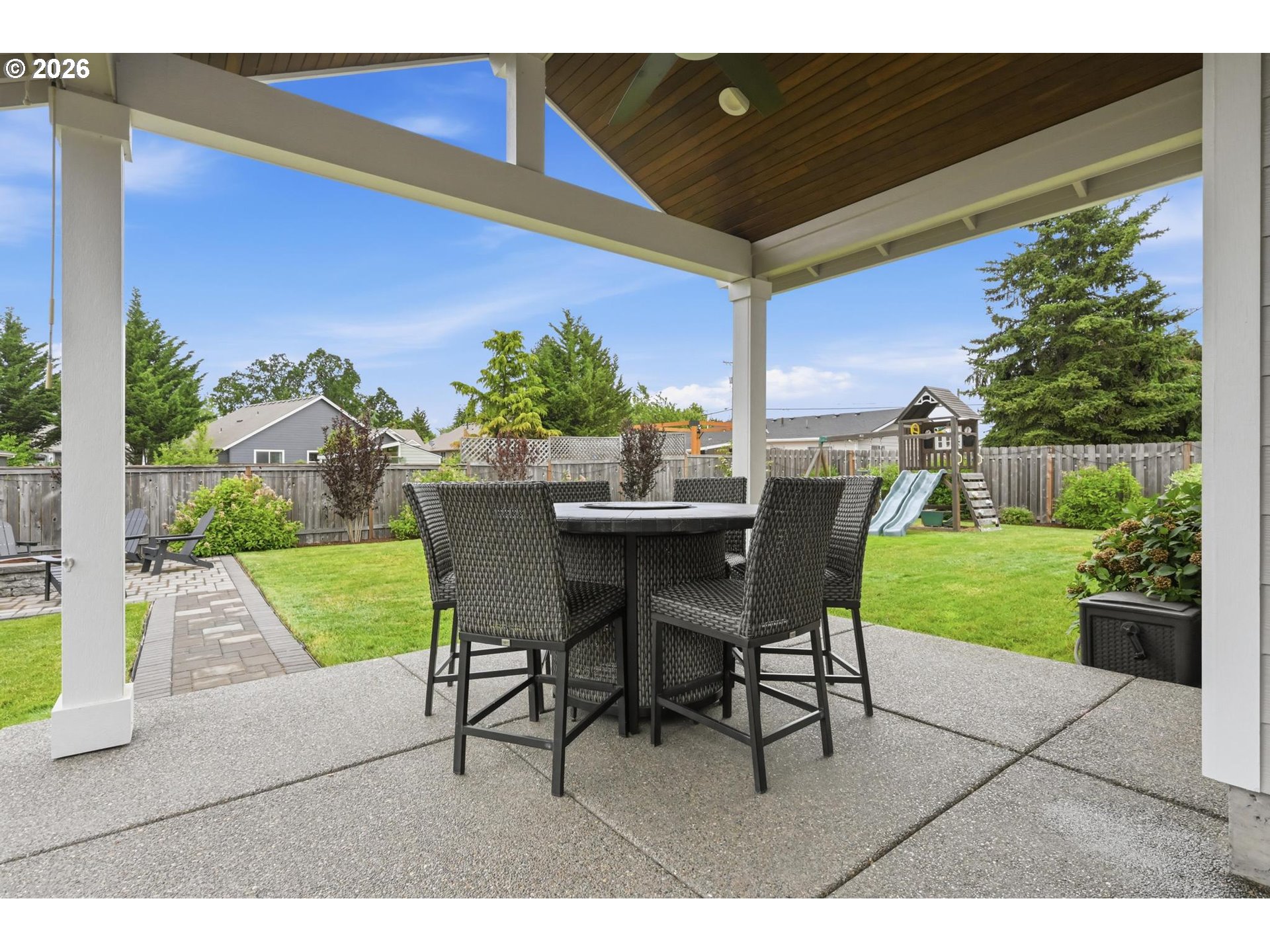 1075 Sage Street Silverton, OR 97381 - Photo 37 of 46 a view of a chairs and table in the patio