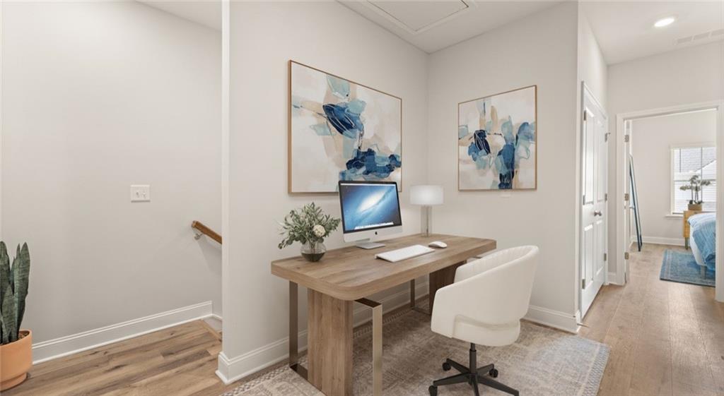 100 Rosemoore Drive Covington, GA 30014 - Photo 10 of 41 a view of a workspace with furniture and wooden floor
