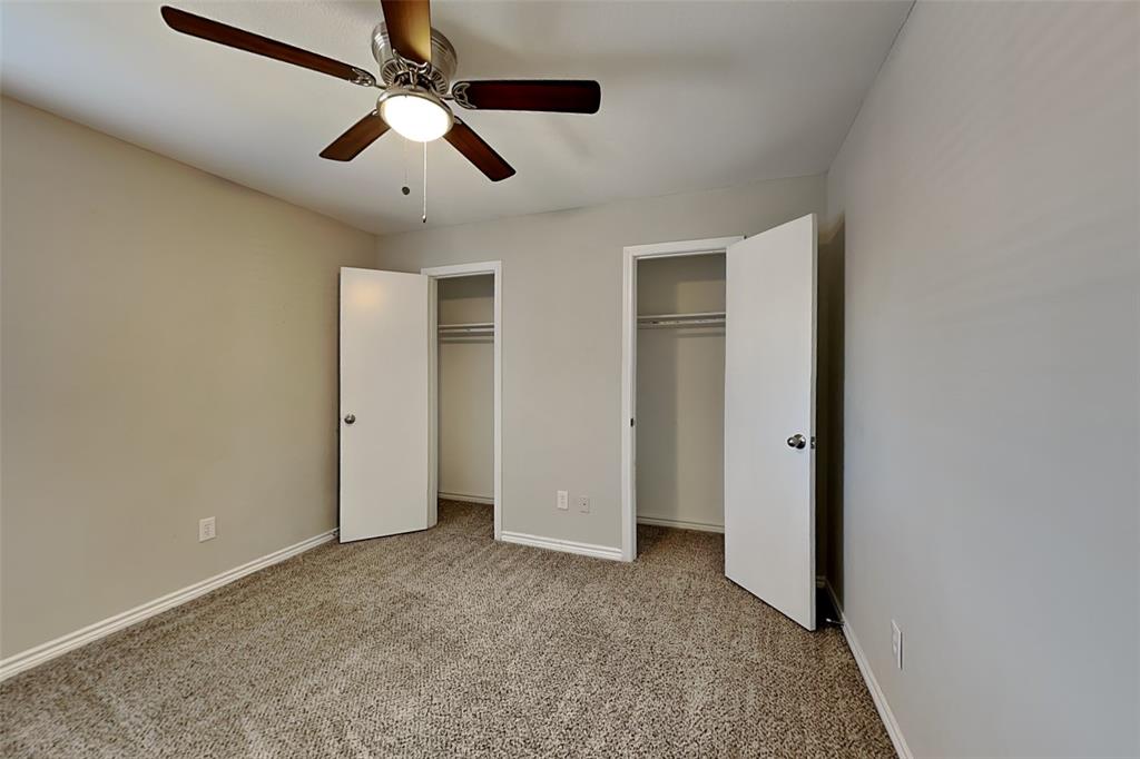 508 Rawhide Court Plano, TX 75023 - Photo 12 of 19 an empty room with chandelier fan