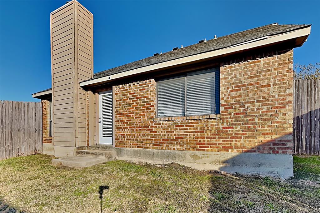 508 Rawhide Court Plano, TX 75023 - Photo 17 of 19 a front view of a house with a yard