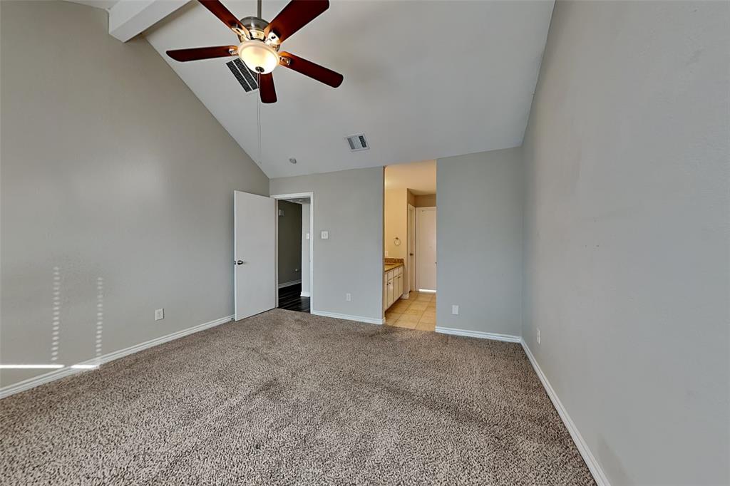 508 Rawhide Court Plano, TX 75023 - Photo 8 of 19 a view of an empty room with a ceiling fan