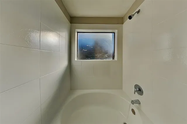 a bathroom with a bathtub