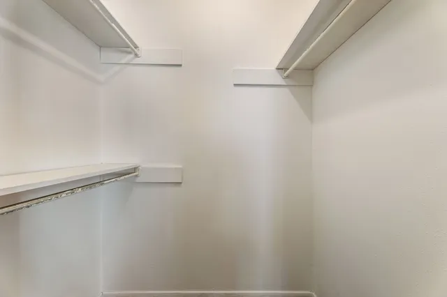 a view of a room with racks on the wall