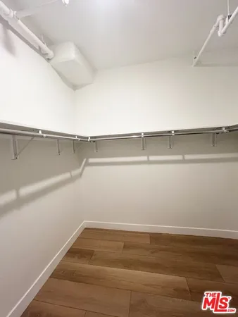 a view of a room with racks on the wall