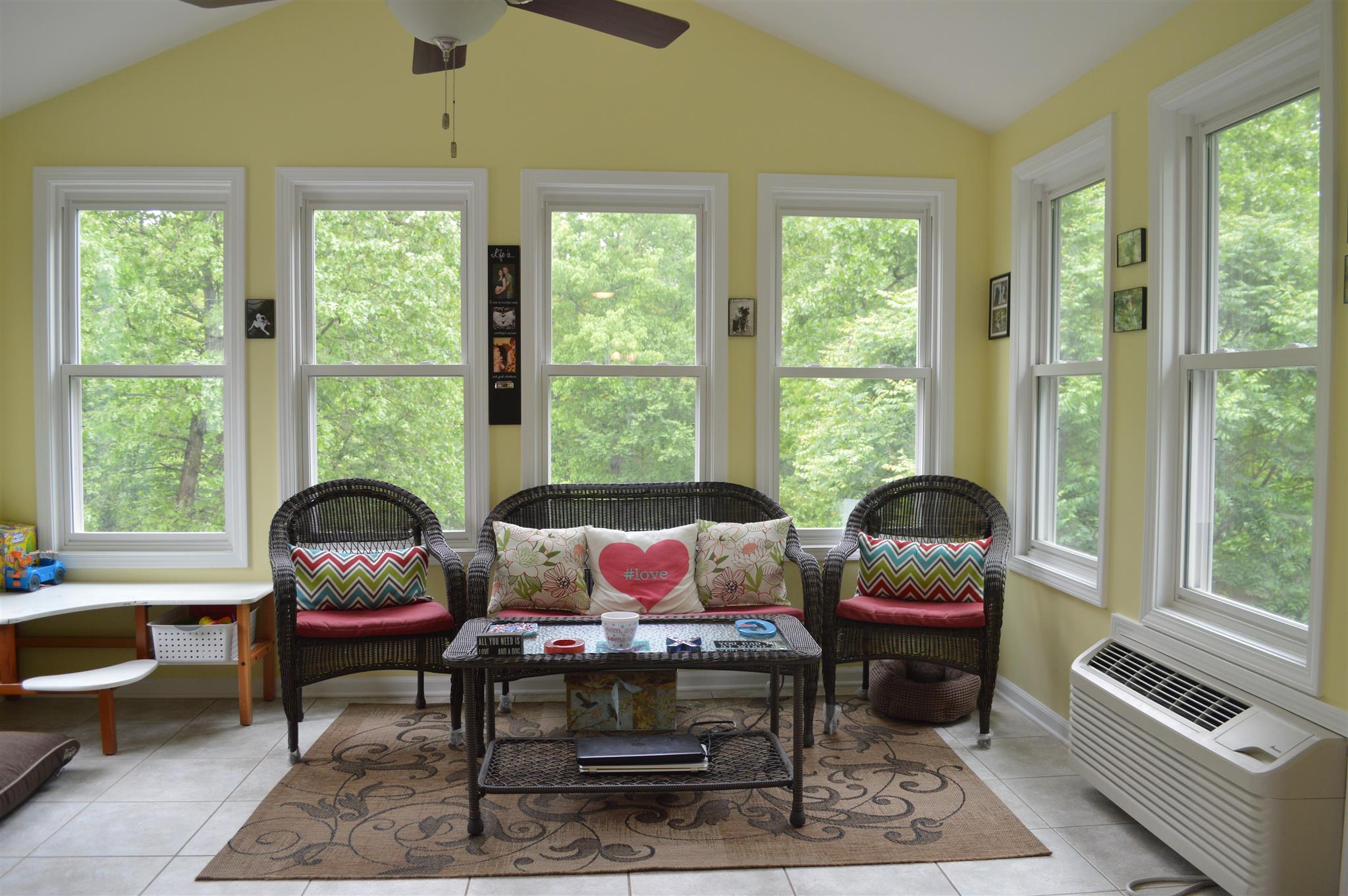 3361 Backridge Road Woodlawn, TN 37191 - Photo 12 of 30 a living room with furniture and a floor to ceiling window