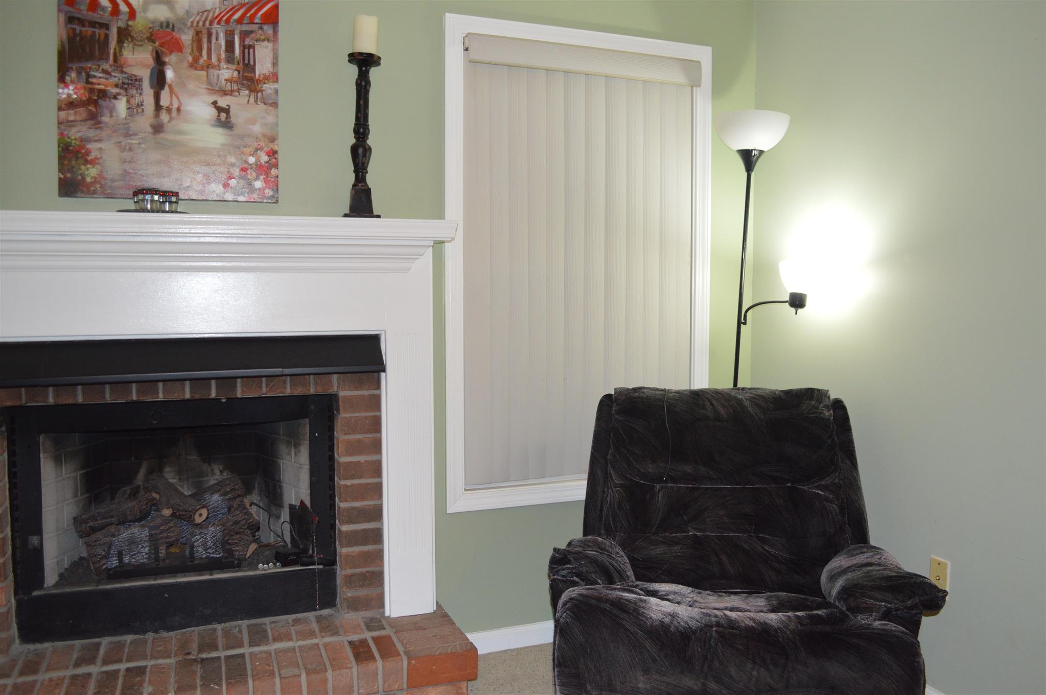 3361 Backridge Road Woodlawn, TN 37191 - Photo 13 of 30 a living room with furniture and a fireplace