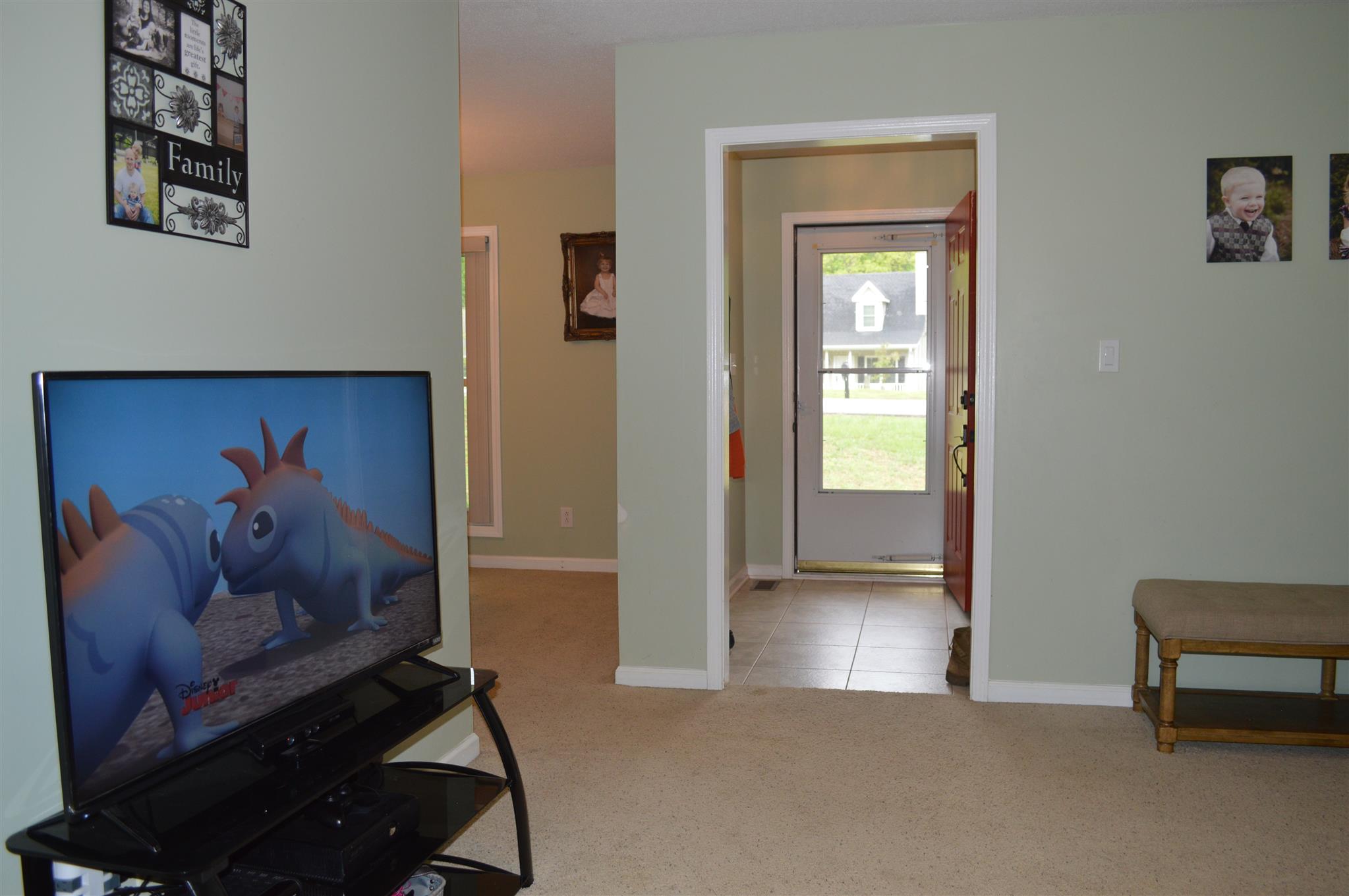 3361 Backridge Road Woodlawn, TN 37191 - Photo 15 of 30 a view of a hallway with workspace and a potted plant