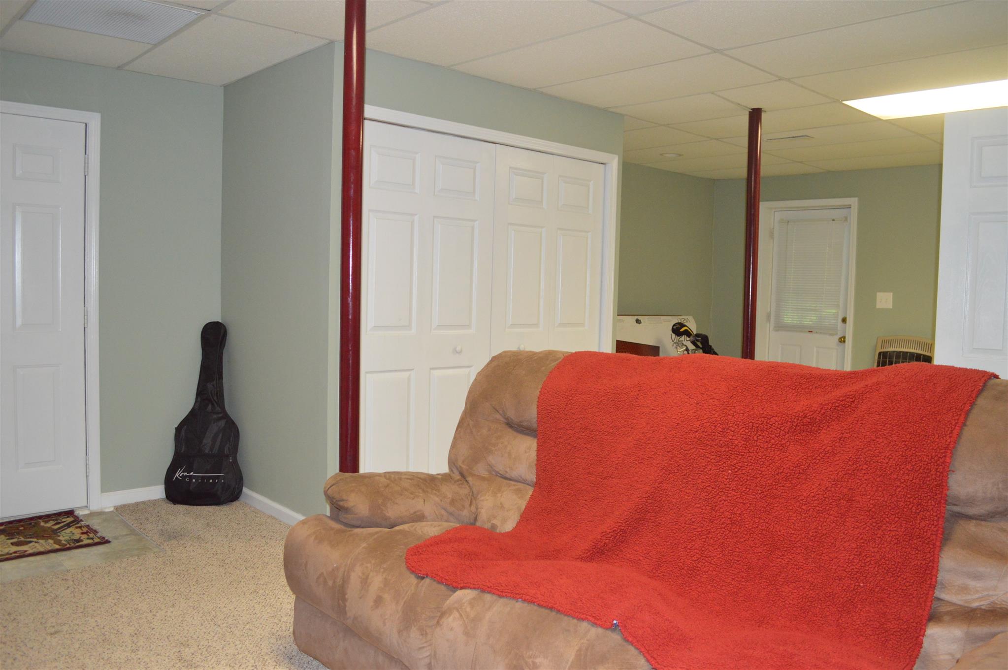 3361 Backridge Road Woodlawn, TN 37191 - Photo 22 of 30 a bedroom with bed and a night stand