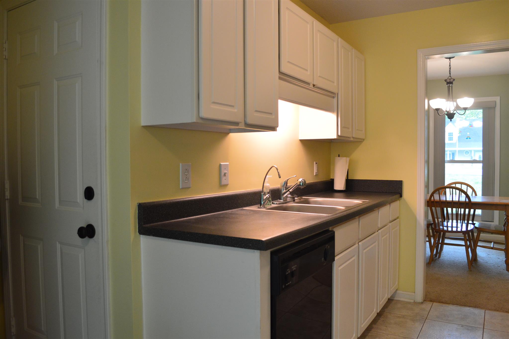 3361 Backridge Road Woodlawn, TN 37191 - Photo 8 of 30 a kitchen with sink and cabinets