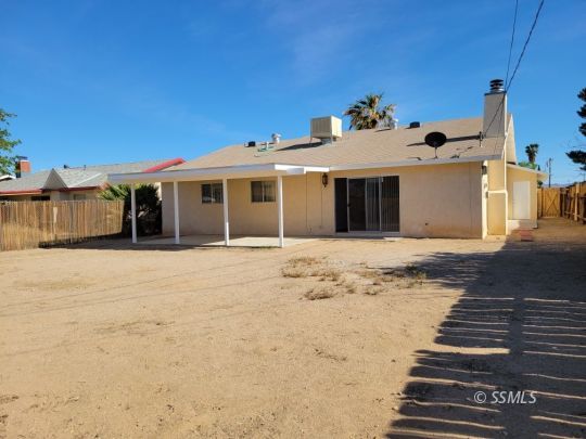 732 West Alene Avenue Ridgecrest, CA 93555 - Photo 34 of 38 a view of a house with wooden fence