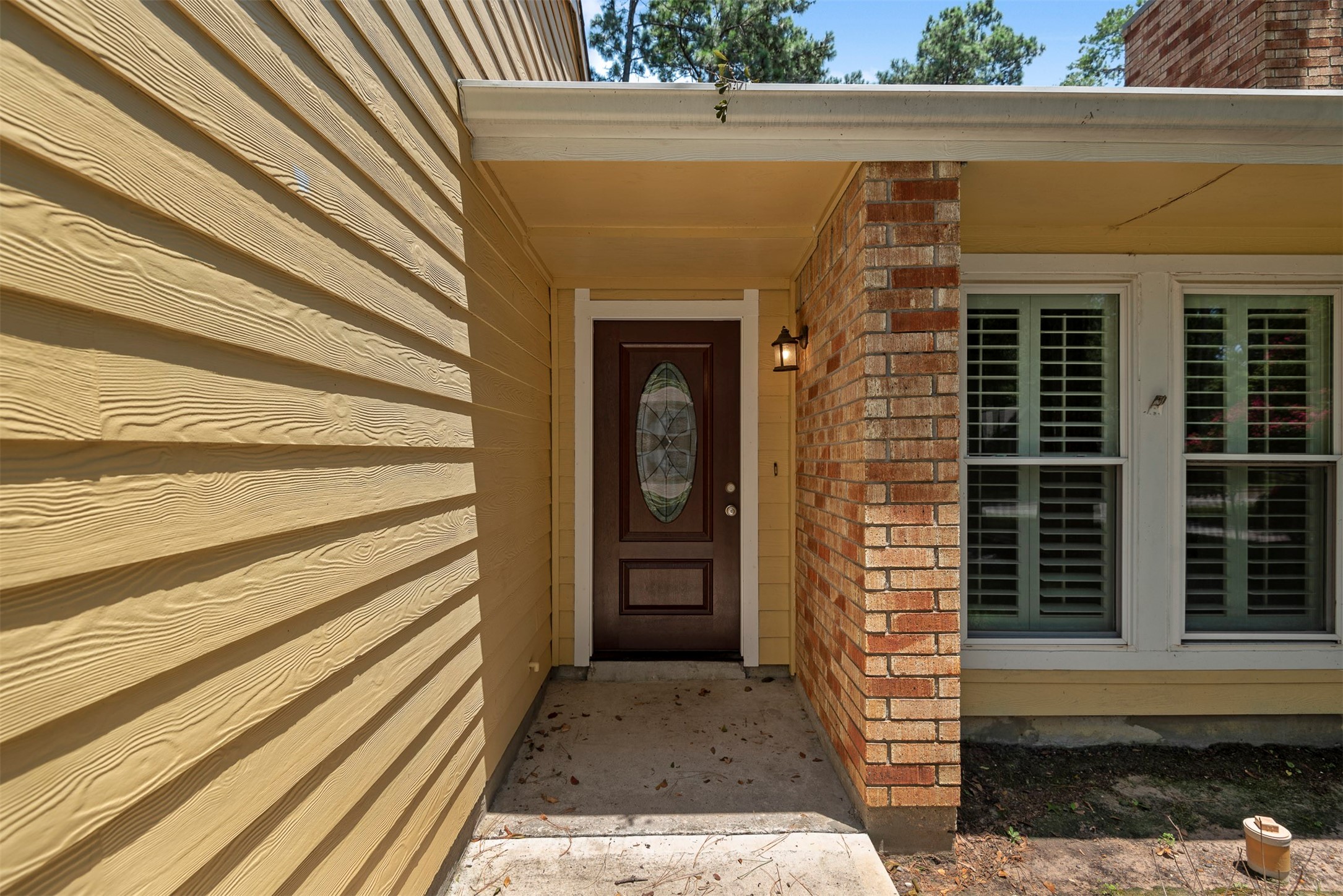30 Berryfrost Lane The Woodlands, TX 77380 - Photo 2 of 33 a front view of a house with a door