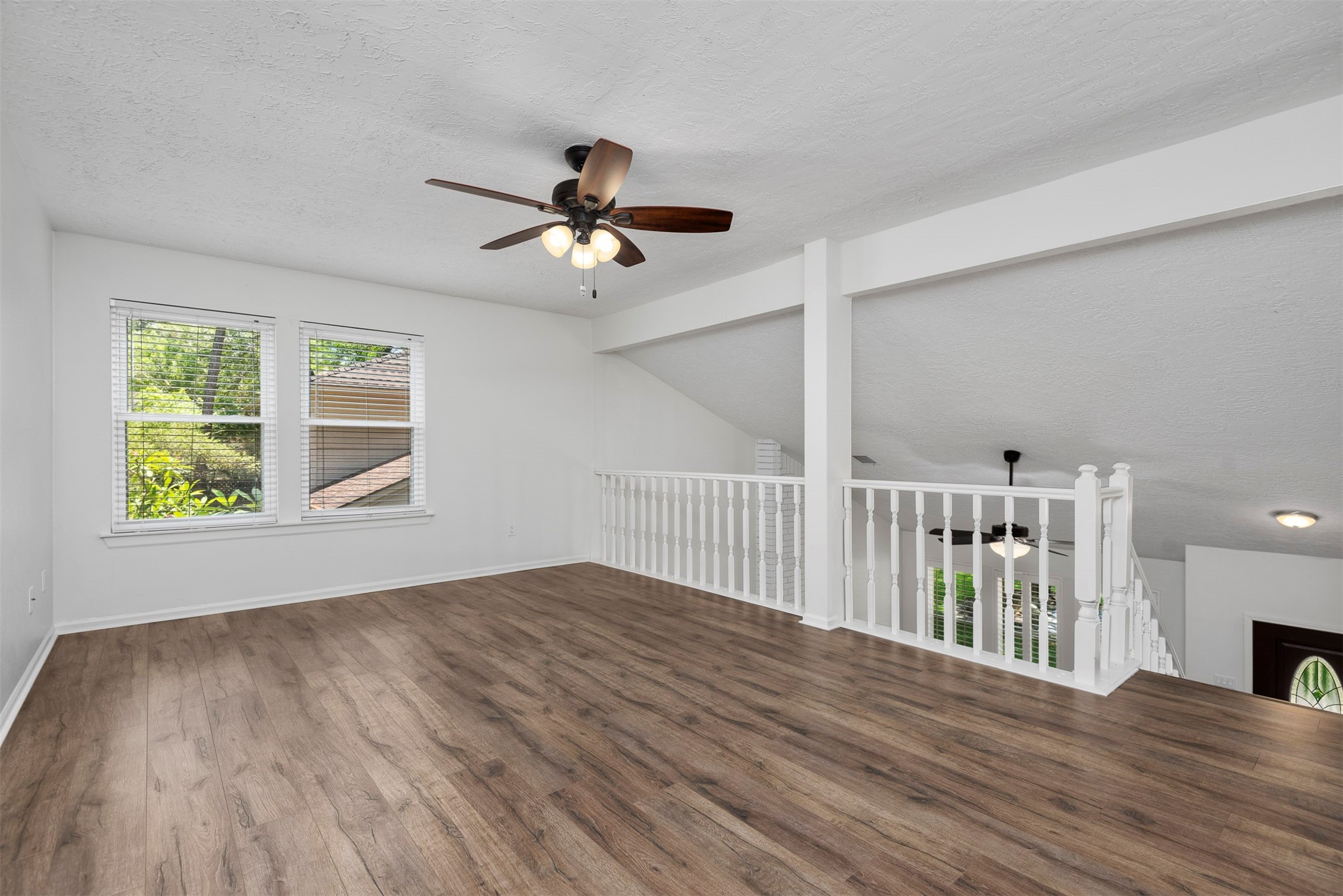 30 Berryfrost Lane The Woodlands, TX 77380 - Photo 23 of 33 a view of entryway with wooden floor