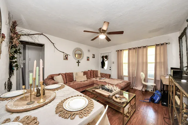 a kitchen with stainless steel appliances granite countertop a sink and a refrigerator