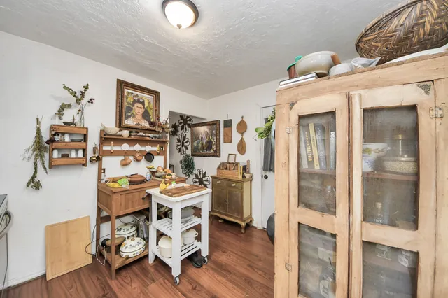 a bedroom with furniture and a bed