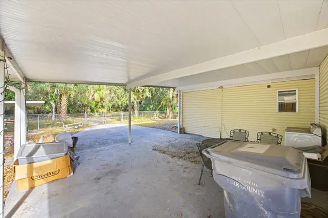 a bathroom with a sink and a large window