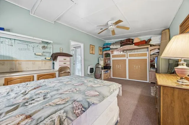 a bedroom with a bed and a walk in closet
