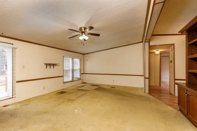a view of a storage & utility room with a washer dryer
