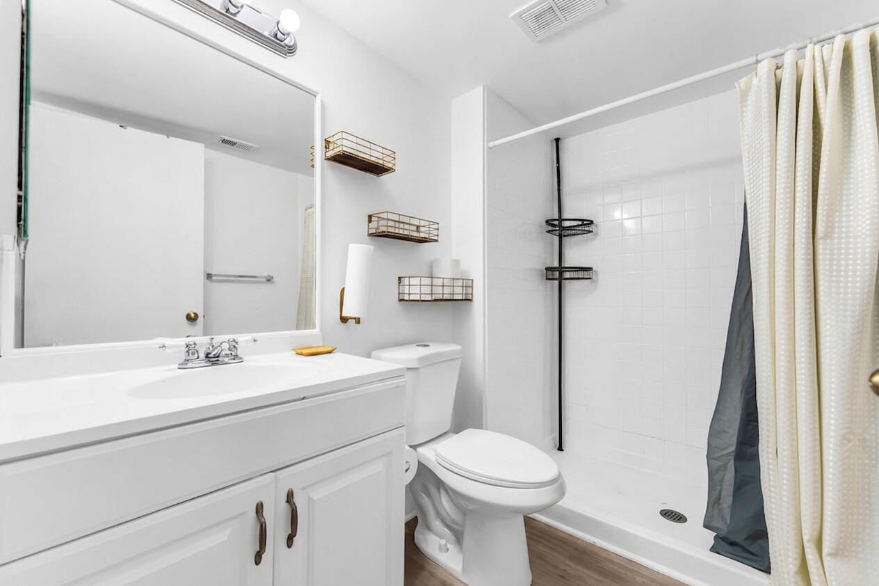 8721 Wiles Road, Unit 103 Coral Springs, FL 33067 - Photo 10 of 25 Decluttered Bathroom