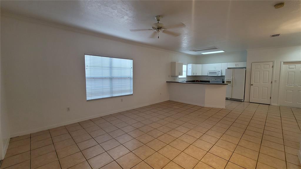 4926 Northwest 78 Road Gainesville, FL 32653 - Photo 5 of 18 a view of a kitchen with a sink and a stove top oven