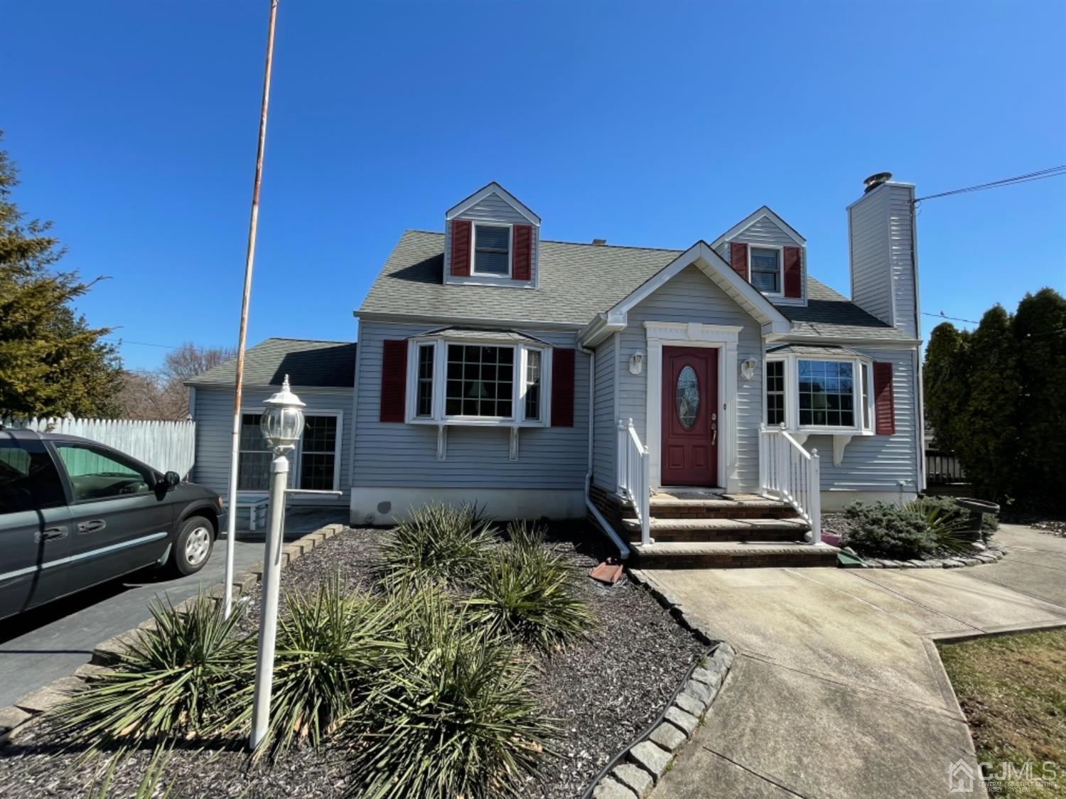 144 Tunison Road New Brunswick, NJ 08901 - Photo 14 of 14 a front view of a house with a yard