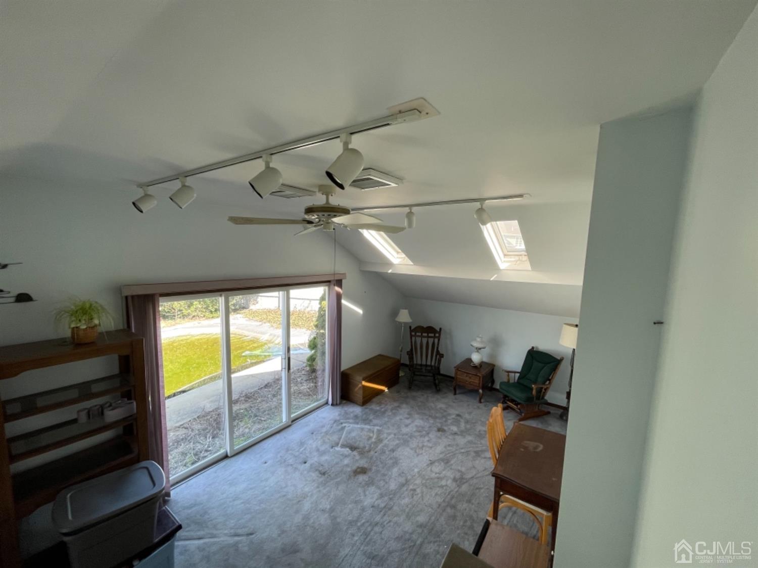 144 Tunison Road New Brunswick, NJ 08901 - Photo 3 of 14 a room with furniture and a window
