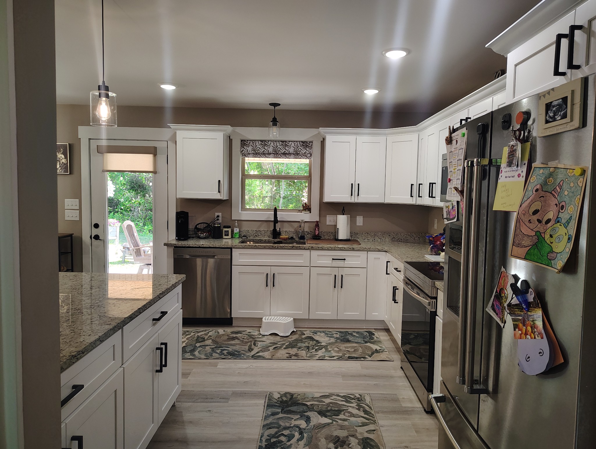 8447 Epperson Springs Road Westmoreland, TN 37186 - Photo 12 of 25 a kitchen with a sink stove and refrigerator
