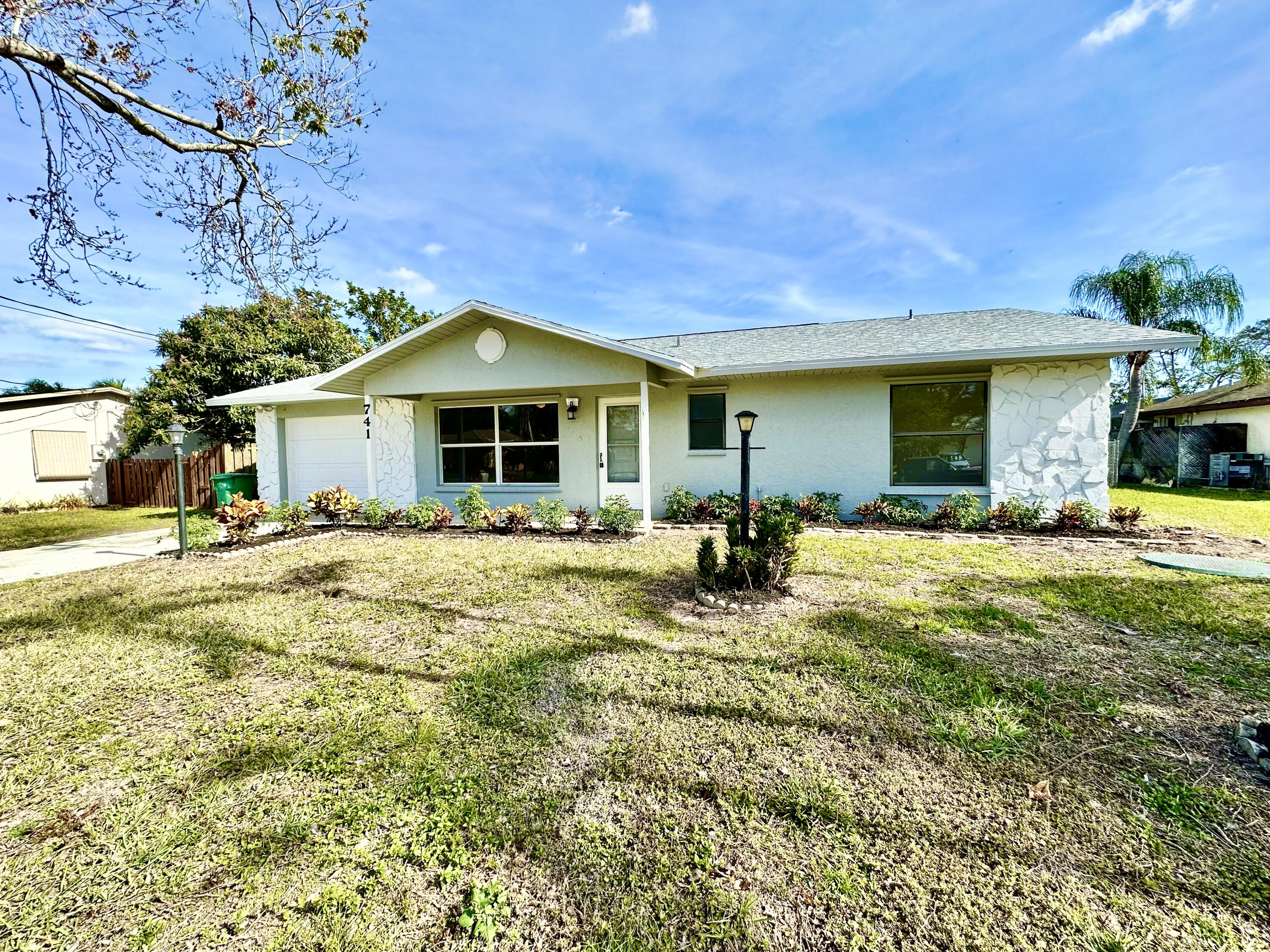 741 Southwest Aster Road Port St. Lucie, FL 34953 - Photo 3 of 32 IMG_8099