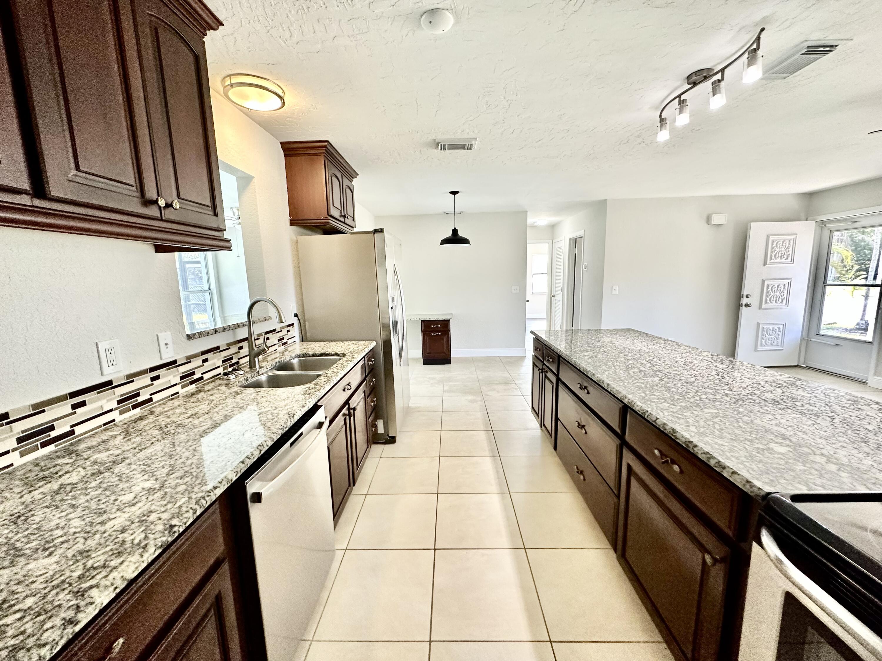 741 Southwest Aster Road Port St. Lucie, FL 34953 - Photo 6 of 32 IMG_8097