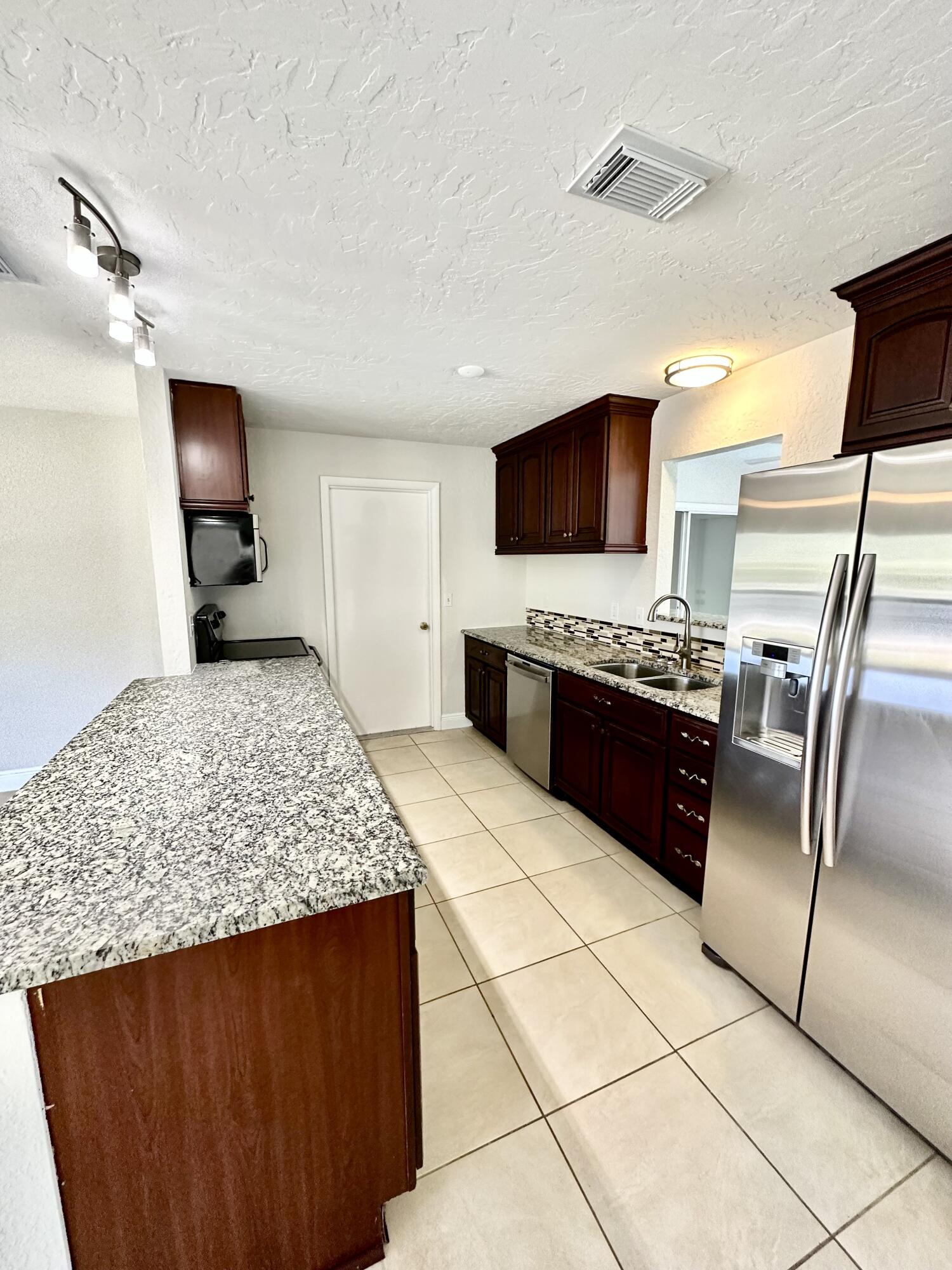 741 Southwest Aster Road Port St. Lucie, FL 34953 - Photo 7 of 32 IMG_8064