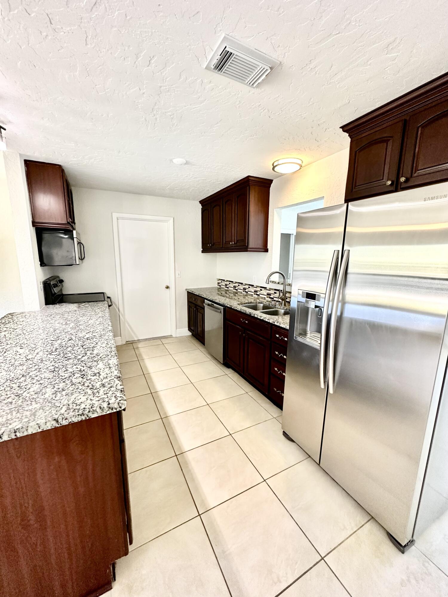 741 Southwest Aster Road Port St. Lucie, FL 34953 - Photo 8 of 32 IMG_8088