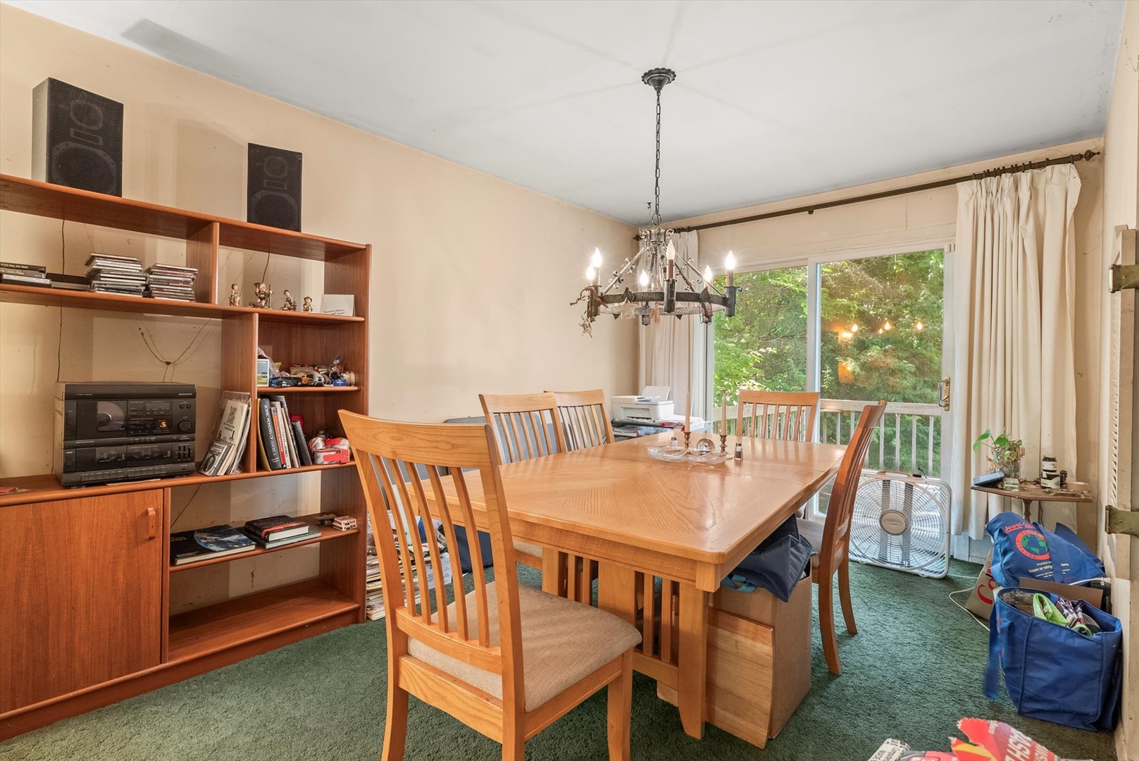 55 Codorus Road Montgomery, IL 60538 - Photo 9 of 27 a dining room with furniture a chandelier and window