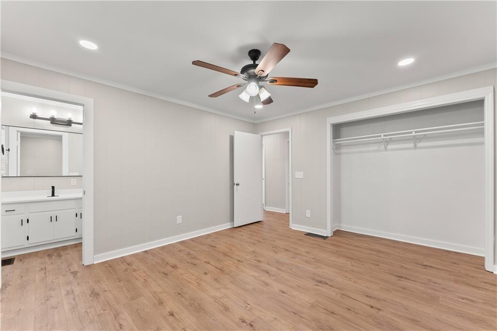 31 Pine Road Dahlonega, GA 30533 - Photo 19 of 32 wooden floor in an empty room with a window