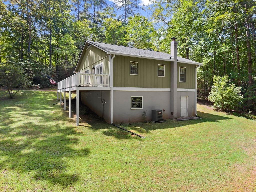 31 Pine Road Dahlonega, GA 30533 - Photo 29 of 32 a view of an house with backyard space and balcony