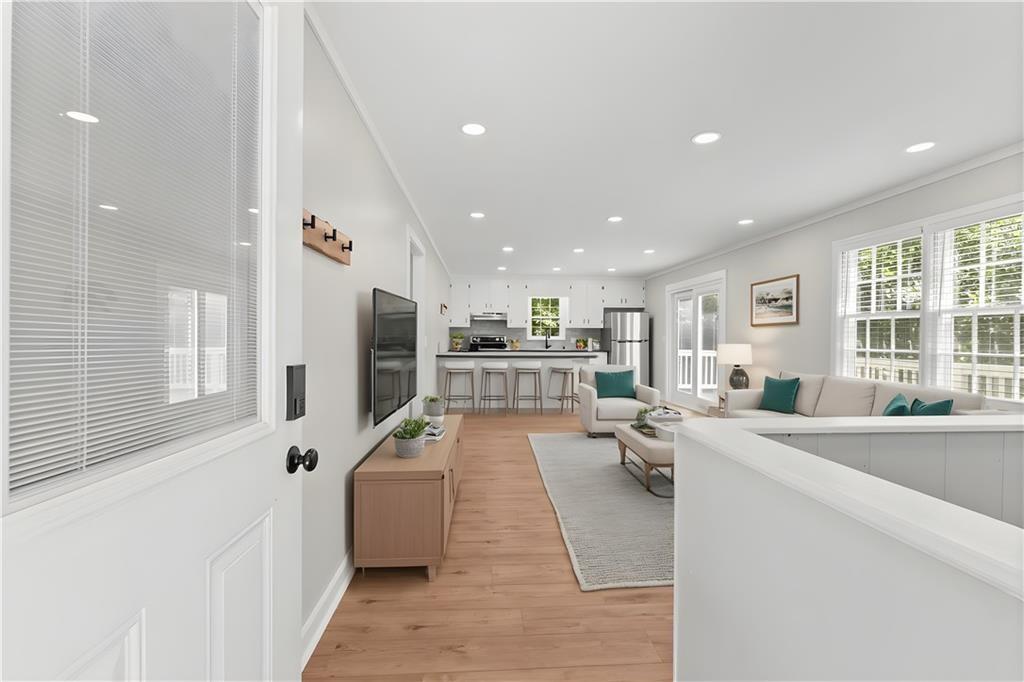 31 Pine Road Dahlonega, GA 30533 - Photo 7 of 32 a living room with furniture and a flat screen tv