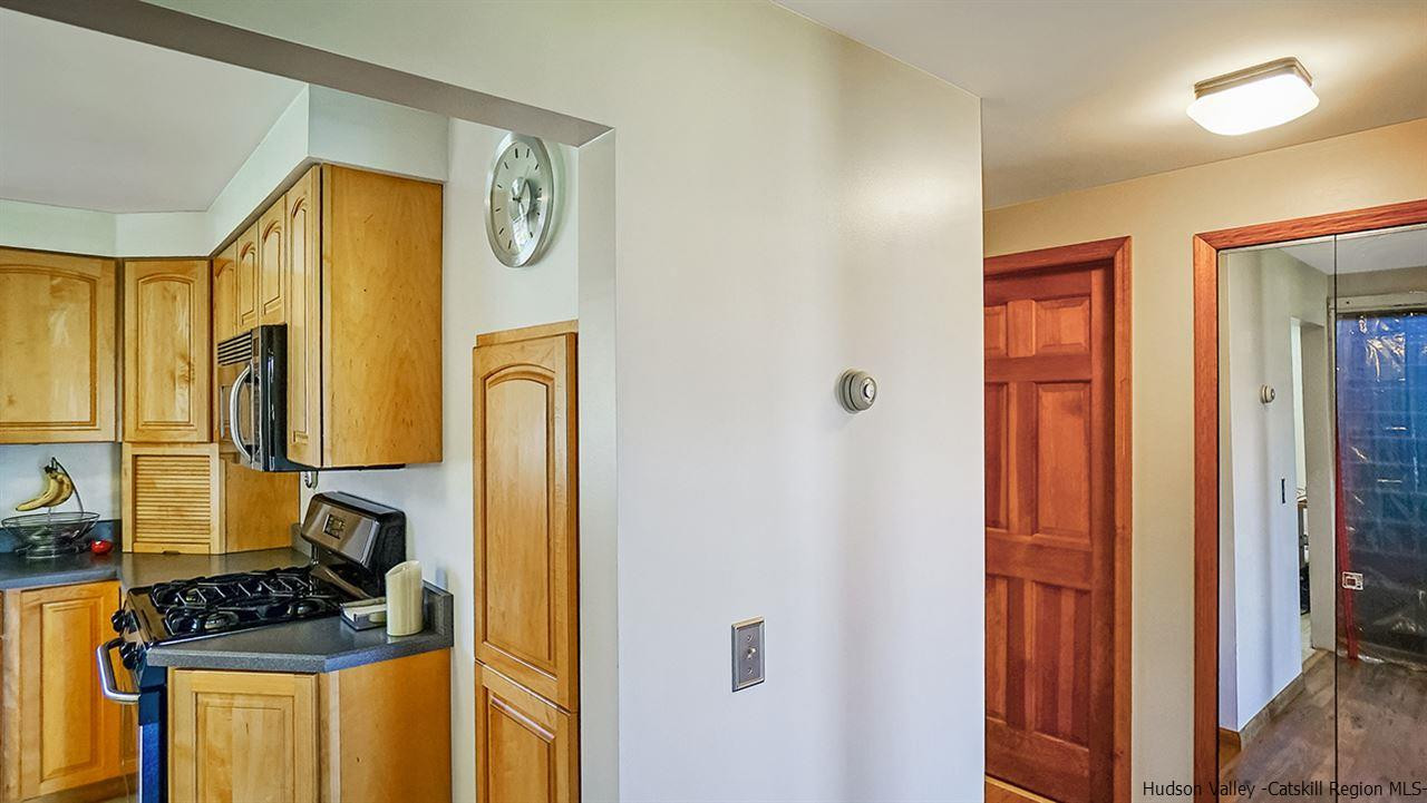 124 Wilhelm Road Saugerties, NY 12477 - Photo 19 of 33 a bathroom with a sink a mirror and a shower