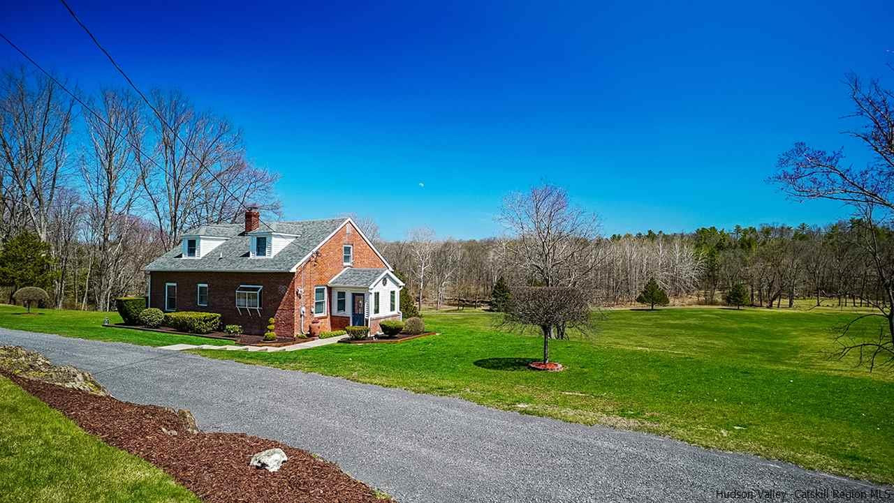 124 Wilhelm Road Saugerties, NY 12477 - Photo 22 of 33 a front view of house with yard and green space