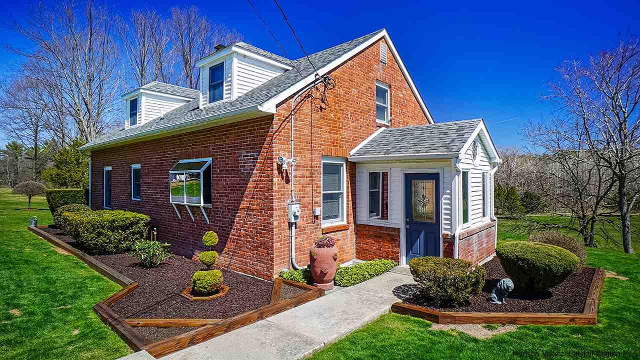 124 Wilhelm Road Saugerties, NY 12477 - Photo 9 of 33 a view of an house with backyard space and garden