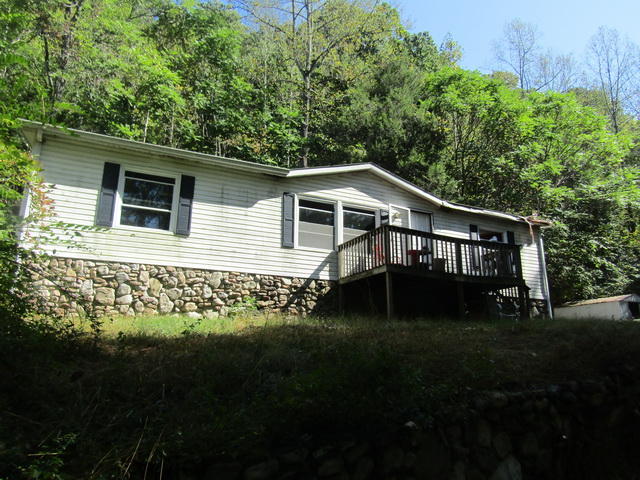 1290 Brake Road Elliston, VA 24087 - Photo 1 of 12 a front view of house with yard and green space