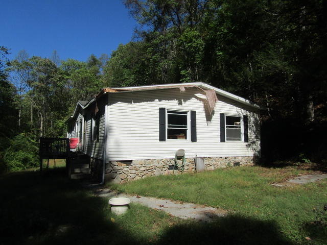 1290 Brake Road Elliston, VA 24087 - Photo 2 of 12 a front view of house with yard and green space