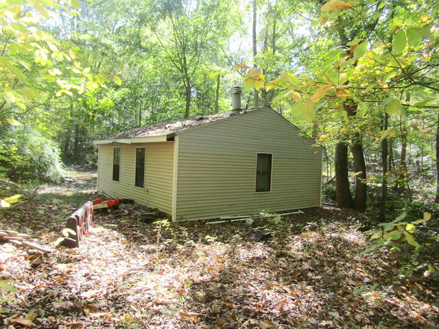 1290 Brake Road Elliston, VA 24087 - Photo 12 of 12 a view of a house with a yard