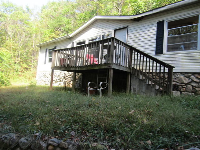 1290 Brake Road Elliston, VA 24087 - Photo 6 of 12 a house view with a garden space