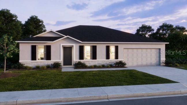3 Porter Lane Palm Coast, FL 32164 - Photo 2 of 15 a front view of a house with a yard