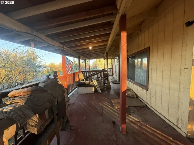 a view of a porch with furniture