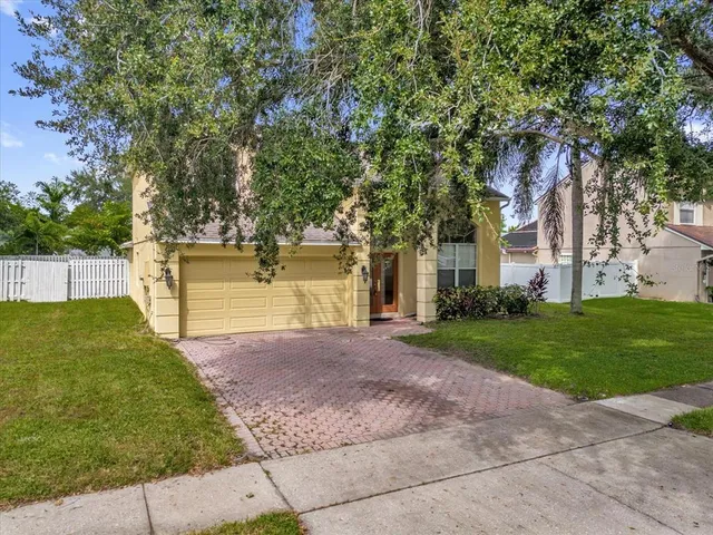 a view of backyard with green space