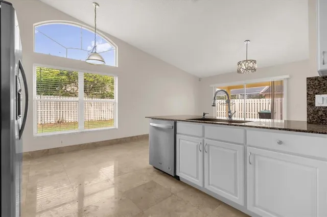 a bathroom with a sink and a window