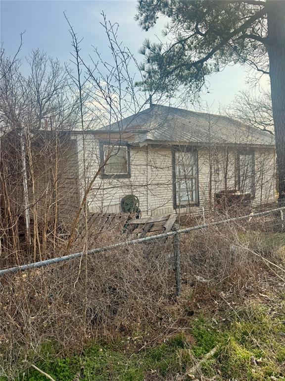 316 West Alley Street Perrin, TX 76486 - Photo 16 of 18 View of the side from the open lot next door