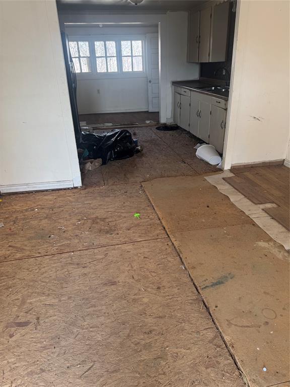 316 West Alley Street Perrin, TX 76486 - Photo 4 of 18 Walking in from front door looking into the kitchen area