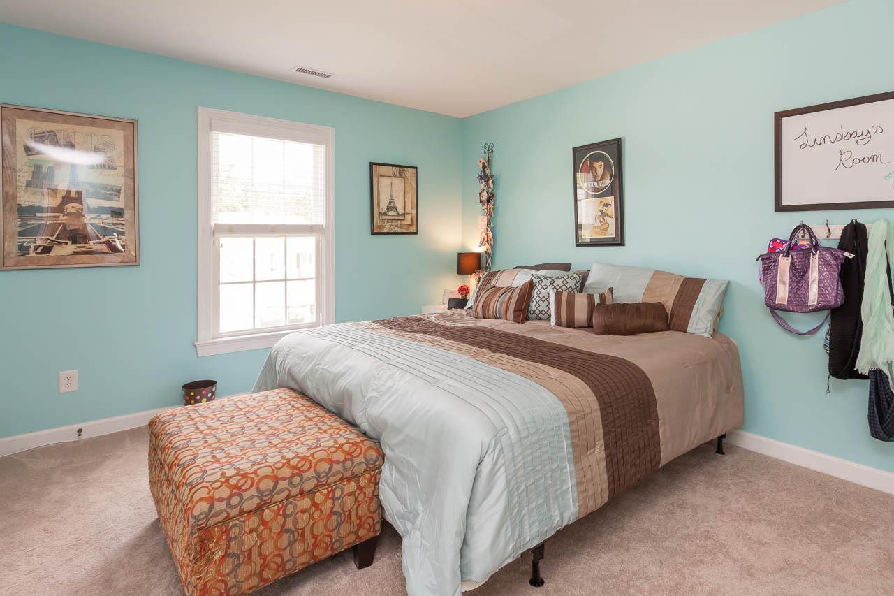 8412 Aptos Court Raleigh, NC 27613 - Photo 18 of 25 This bonus room is being used by the teenager as her bedroom. Bonus Room/Bedroom