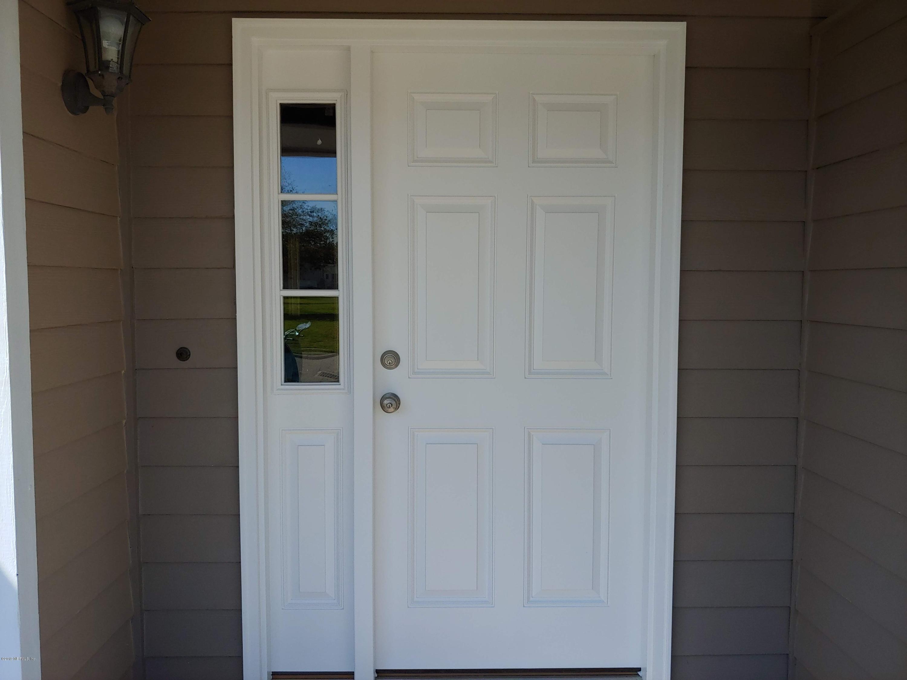 791 Assisi Lane, Unit 303 Jacksonville, FL 32233 - Photo 2 of 35 a view of door